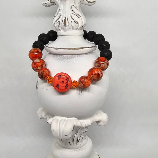 Orange Glass and Black Lava Rock Pumpkin Stretch Bracelet (10mm)