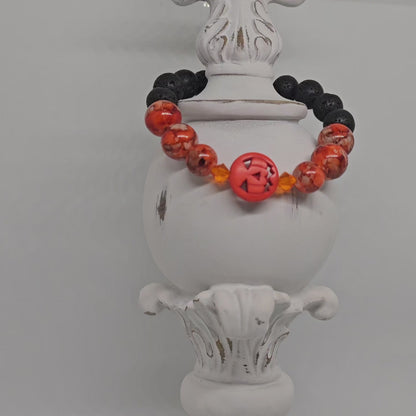 Orange Glass and Black Lava Rock Pumpkin Stretch Bracelet (10mm)